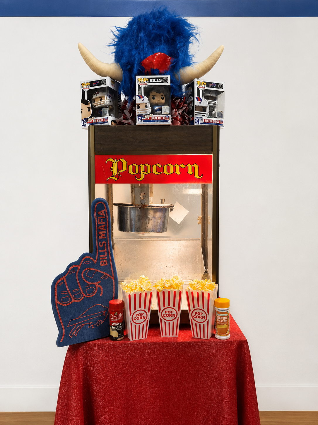 Popcorn machine with fresh popcorn and themed decorations