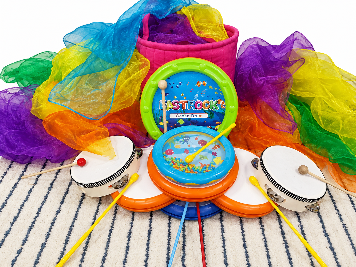 Colorful rainbow scarves and drums for Zumbini music play